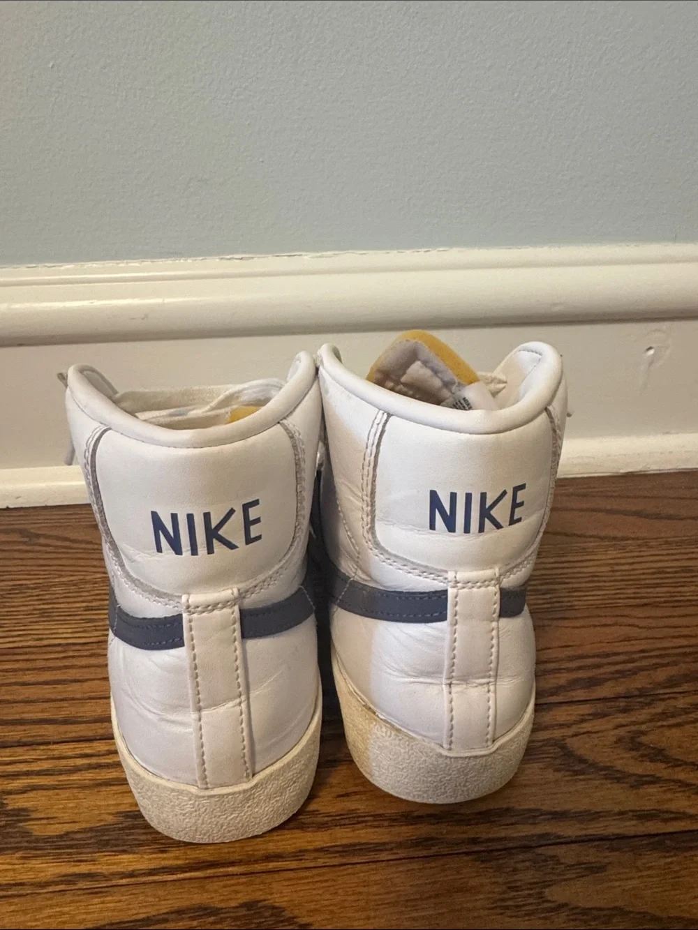 Women’s White High-Top Nike Sneakers